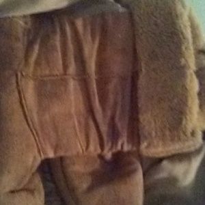 A pair of sketcher snow boots.